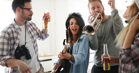 Cheerful happy group of friends having fun