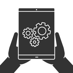 Hands holding tablet computer glyph icon