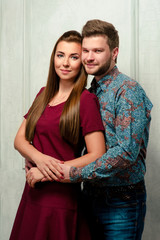 portraite of young attractive beautiful stylish cuddling couple