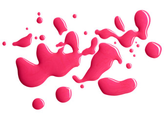 Blots of pink nail polish isolated on white background