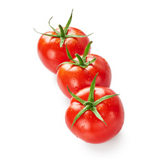 Tomatoes with drops of water isolated on white background