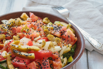 Vegetable salad (Bulgarian pepper, tomato, cucumber, olives, onion, black sesame). Vegan