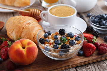 Fresh crusty croissants and muesli for morning meals