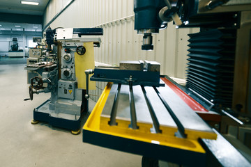 Machining shop, two vertical milling machine.