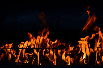 Black background with flames (red-hot grill)