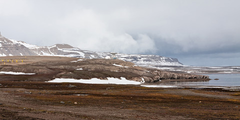 Mountain landscape and satellite dish in Ny Alesund, Svalbard islands
