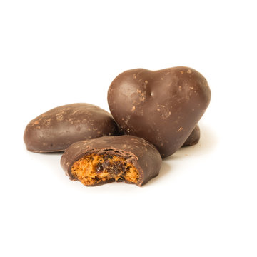 Christmas cookies heart-shaped. Traditional European lebkuchen Christmas cookies heart-shaped. Isolated on white background.