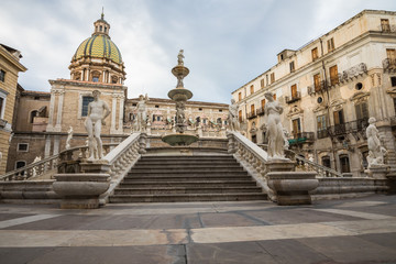 Fototapeta na wymiar Famous fountain of shame on baroque Piazza Pretoria, Palermo, Sicily, Italy