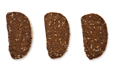Slices of whole grain bread on white background