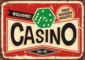 Naklejka premium Casino retro sign. Vintage tin sign with green dice on red background,