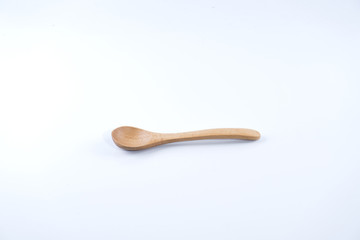 Isolated wooden ladle in white background