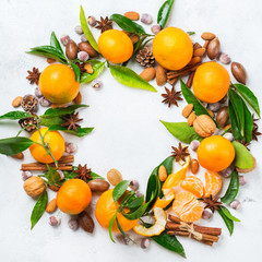 Christmas wreath with spices and tangerine