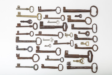 Set of vintage forging iron keys , isolated on white backgroung