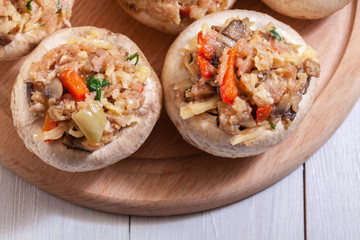 Champignon caps stuffed with minced meat