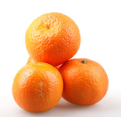 Fresh tangerine fruits on a white background