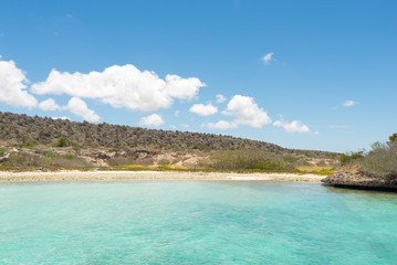 Beautiful beach with colorful water in the Caribbean Sea, at Tortuga Island.