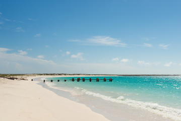 Heavenly-looking solitary beach with little pier in the Caribbean Sea. La Tortuga (Turtle) island, Venezuela.