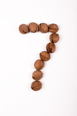 the number seven nuts on white background, isolated