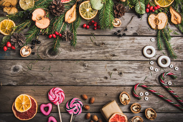 New Year composition of flowers, gifts on a wooden table. Christmas background. Flat lay.Top view