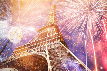 celebrating New Year in the city - Eiffel tower (Paris, France) with fireworks - Powered by Adobe