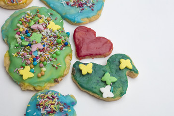 Group of colorful homemade Christmas cookies and biscuits in isolated white background