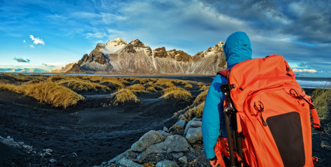 Young man traveler with backpack, Iceland