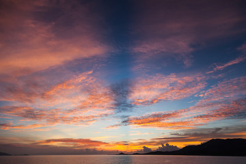 Fototapeta premium beautiful sunset over calm ocean surface