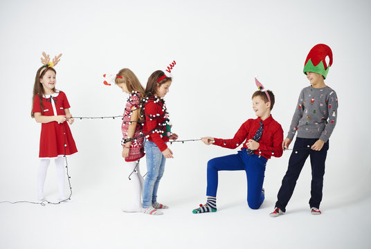 Children playing with christmas light