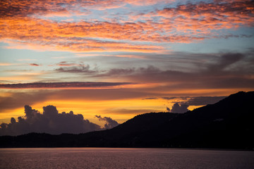 beautiful sunset seascape under cloudy sky