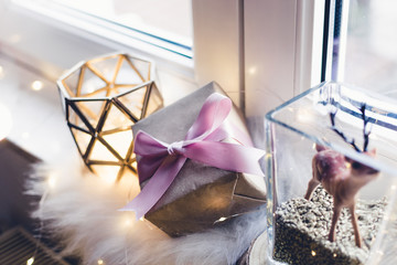 Christmas decorations on a white window