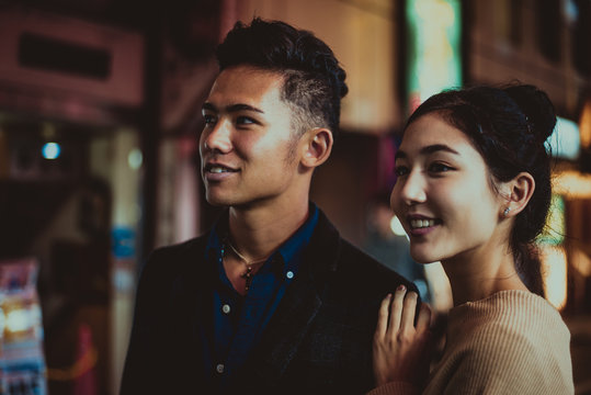 Young japanese couple spending time together in Tokyo