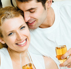 Cheerful couple with champagne