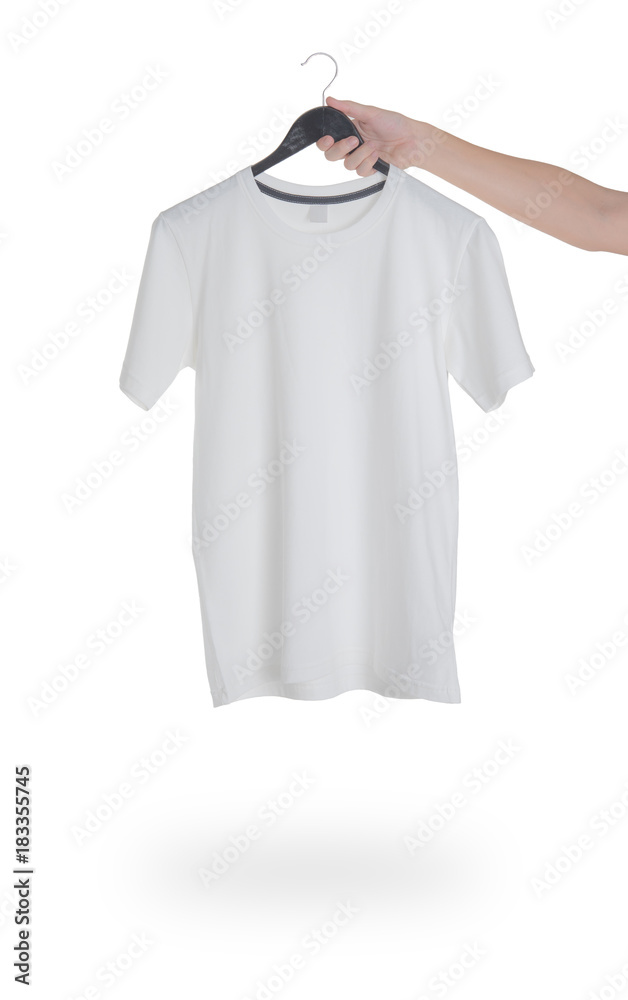 Wall mural Set blank t-shirt on wooden table