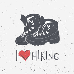 Hiking boot&rsquo;s silhouettes with hand drawn text I love Hiking. Vector illustration on grunge background for prints, posters and t-shirts design. Travel, wildlife, adventure and outdoor symbol.