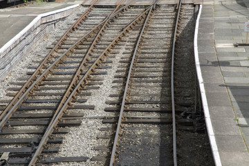 Naklejka na ściany i meble Railway Track with Station Platform