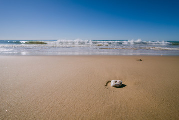 Beach with waves and stones in Portugal