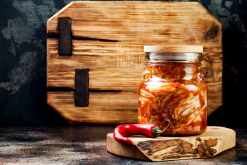 Cabbage kimchi glass jar. Korean traditional cuisine. Fermented food.