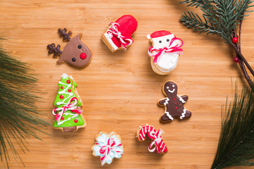 Christmas homemade gingerbread cookies on wooden table