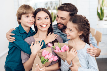 The family together celebrates the holiday on March 8.
