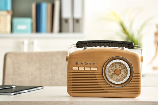 Stylish radio receiver on office table