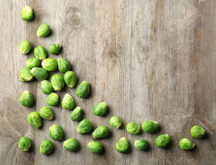 Raw Brussels sprouts on wooden table