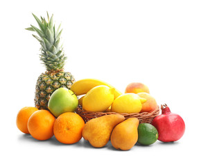 Fresh fruits and basket on white background