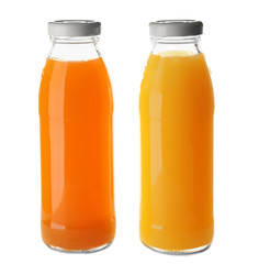 Bottles with juices on white background