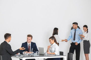 Team of young consulting experts on business meeting in office