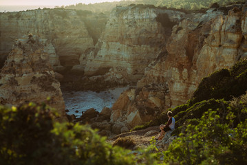 Watching the sunset from a cliff in Portugal