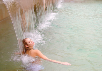 Beautiful woman relax in spa pool
