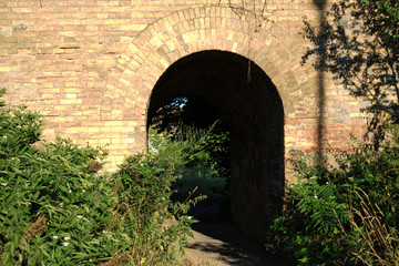 An old brick tunnel in the countryside