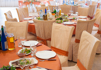 laid restaurant tables for wedding party