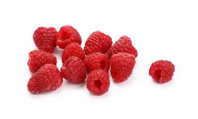 Fresh red ripe raspberries on white, close up
