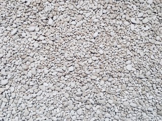Detail of a textured white pebbles